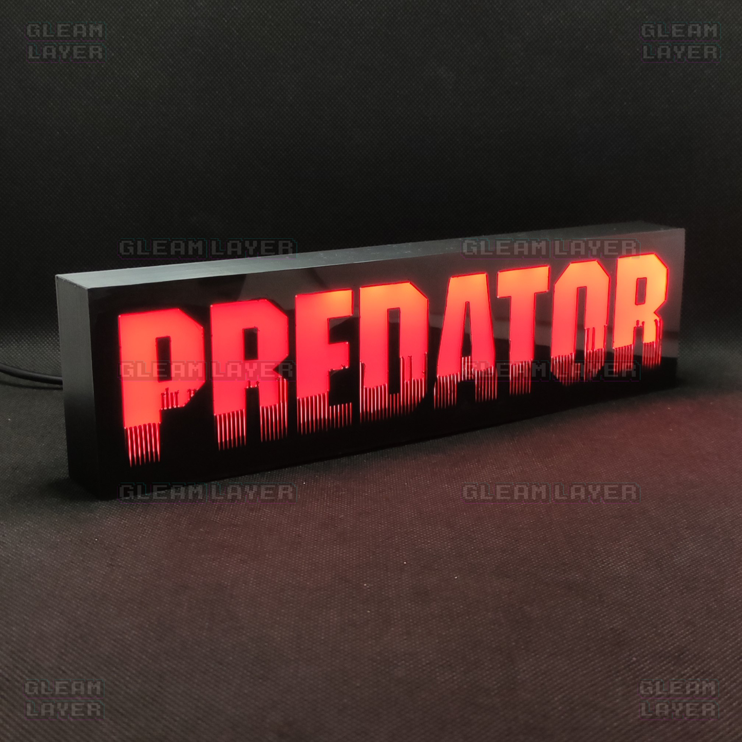 An illuminated Predator movie LED RGB light sign shown from the front, perfect for cinema room setup and home theater decor.
