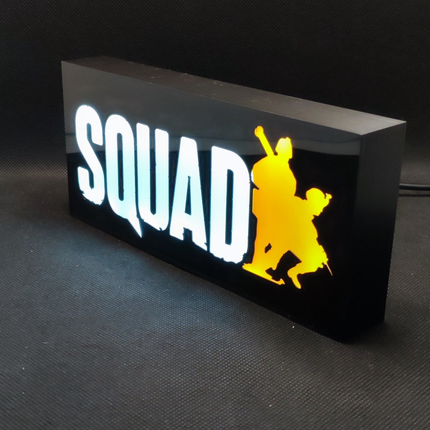 A SQUAD military combat game LED RGB light sign displaying multiple color options, USB connection, and remote control features for gaming setup decoration.
