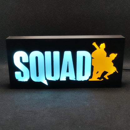 A right side perspective of the SQUAD military combat game LED RGB light sign showing depth and structure, designed for tactical gaming room lighting.